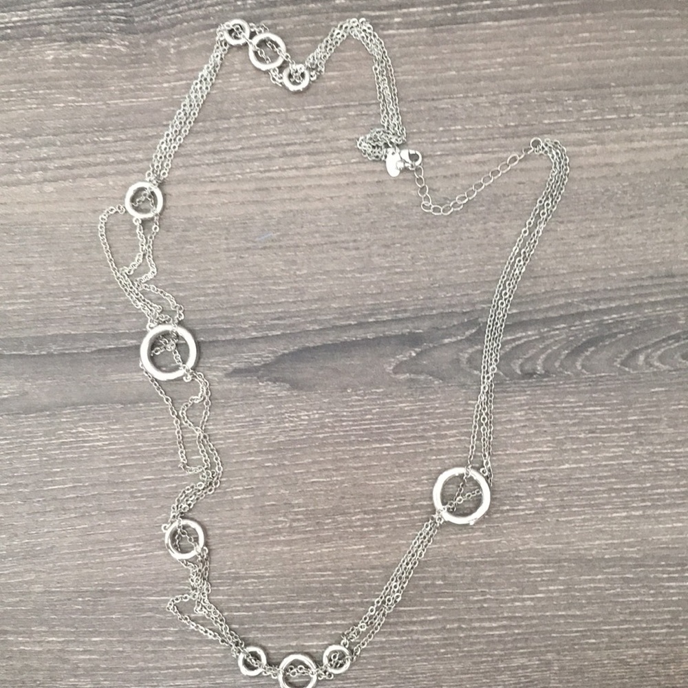 Silver necklace with triple strands and circles